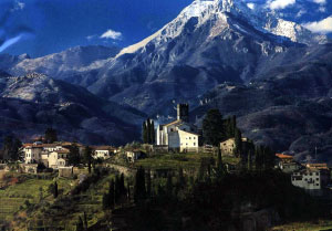 Castle with majestic mountain behind.